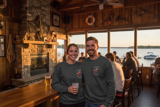 Black sweatshirt with a logo on the chest against a white background