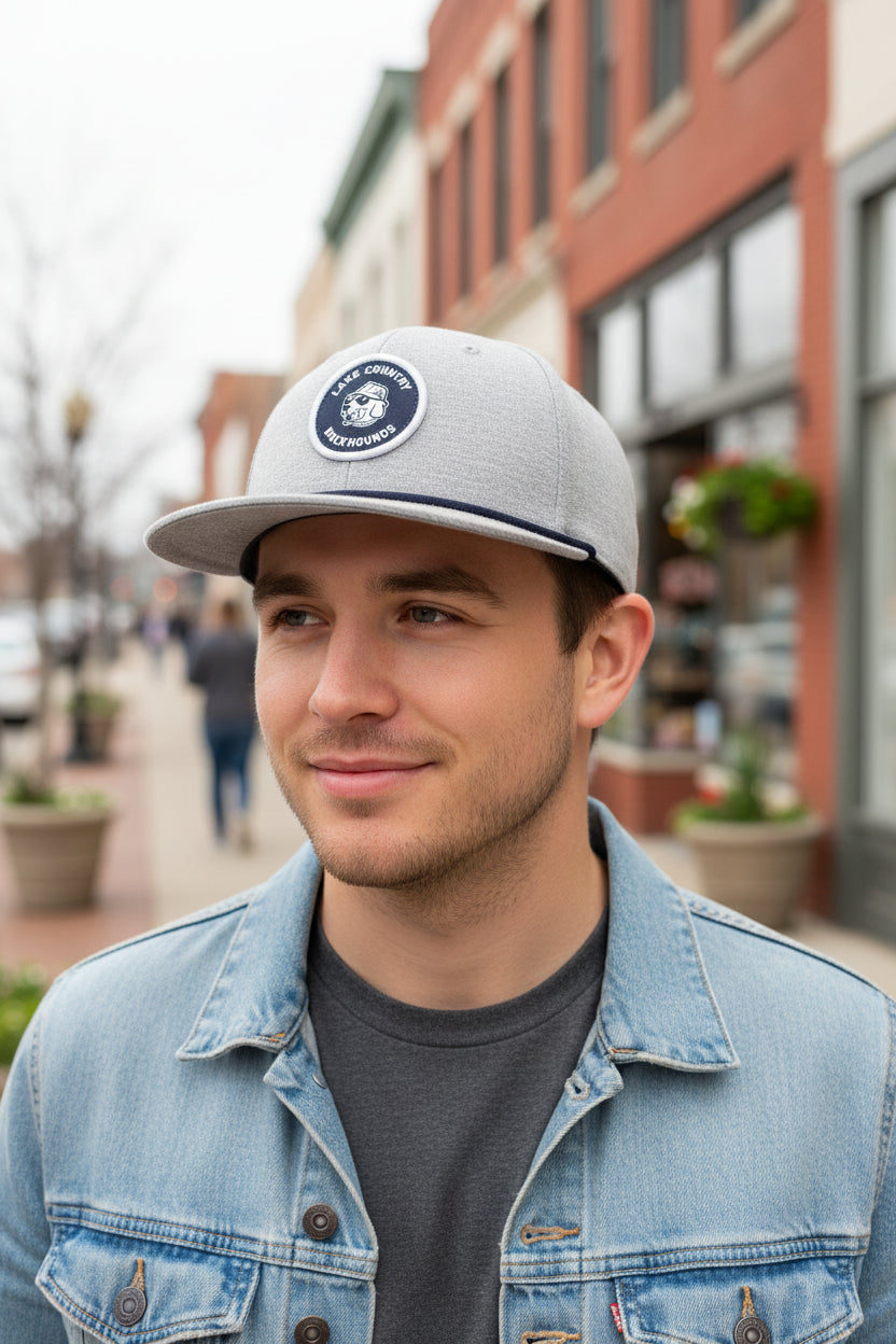 Gray cap with a circular logo on a white background